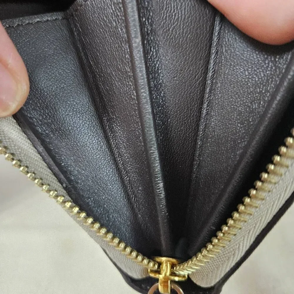 Louis Vuitton Taurillon portefeuille Comete long zip wallet